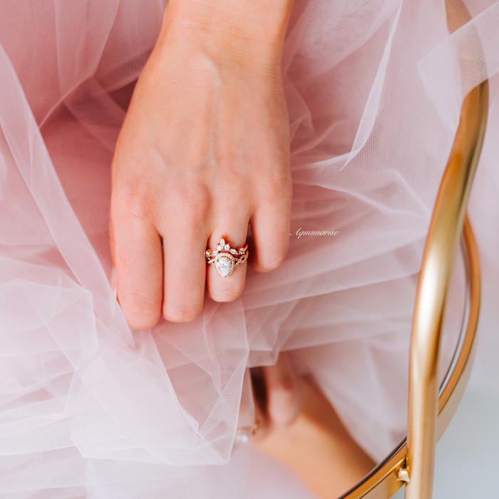 Nouveau Diamond (cz) Engagement Ring Set- 14K Rose Gold Vermeil on hand with soft pink tulle, featuring Aquamarise’s elegant rose gold pavé and twisted vine design.