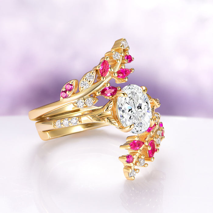 Lab-Grown Diamond Leaf Engagement Ring in 14K Solid Yellow Gold (IGI Certified) by Aquamarise Gold, showcasing a nature-inspired design with a sparkling oval diamond centerpiece accented with vibrant pink gemstones and delicate leaf motifs, part of Solid Gold Engagement Rings and April Birthstone Jewelry collections.