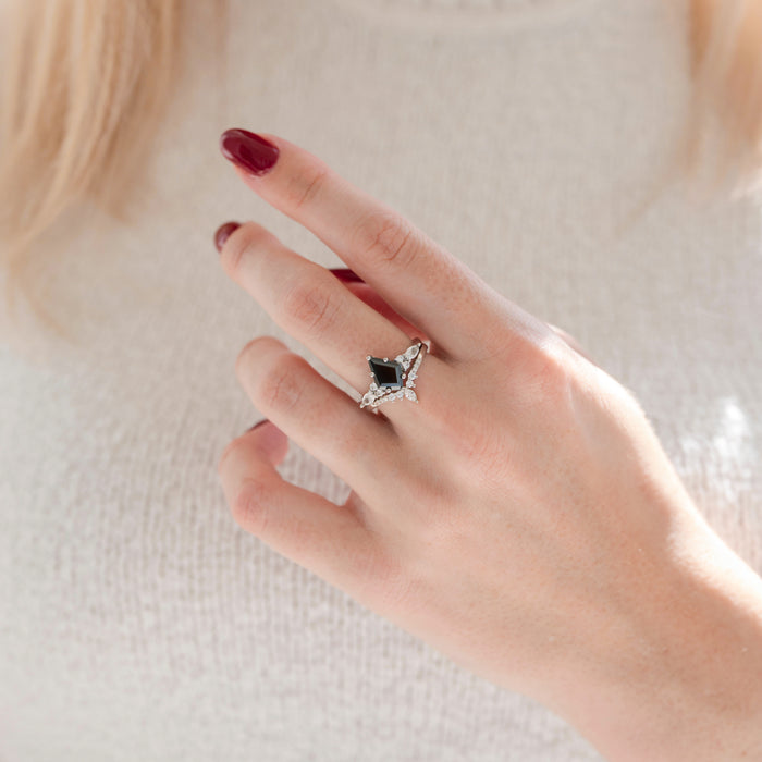 Skye Kite™ Black Onyx Couples Ring Set by Aquamarise featuring a kite-cut black onyx with marquise and round white gemstones on a delicate band, styled on hand.
