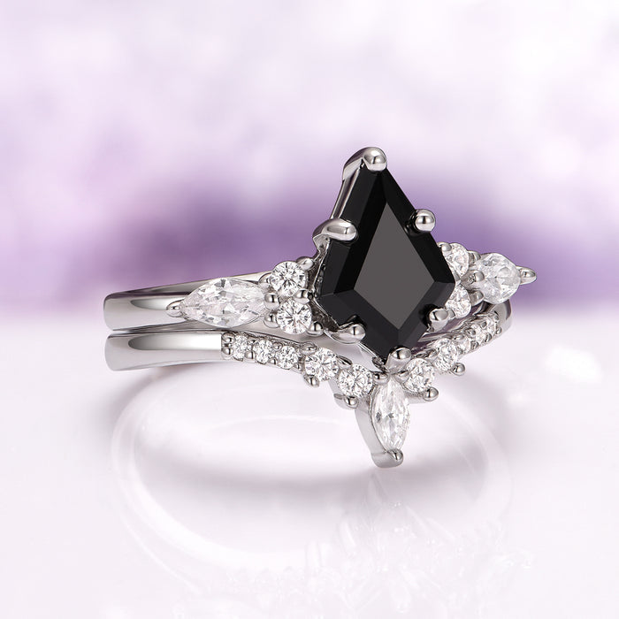 Skye Kite™ Black Onyx Couples Ring Set by Aquamarise featuring a kite-cut black onyx with marquise and round white gemstones in a gothic-inspired silver band design.
