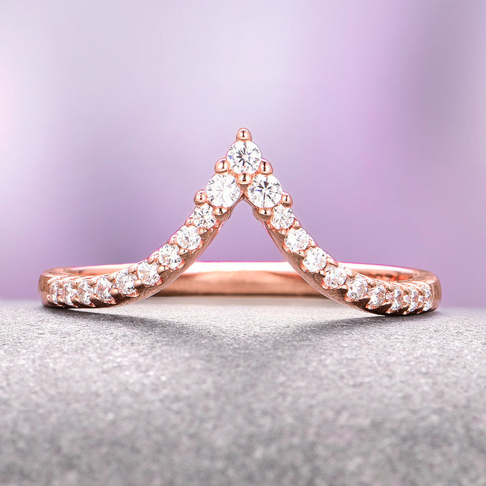 Skye Kite® Chevron Stacking Wedding Band in 14K Solid Rose Gold by Aquamarise Gold displays a delicate V-shaped design accented with shimmering petite moissanite stones, part of Solid Gold Women's Wedding Bands and Rose Gold Rings collections.