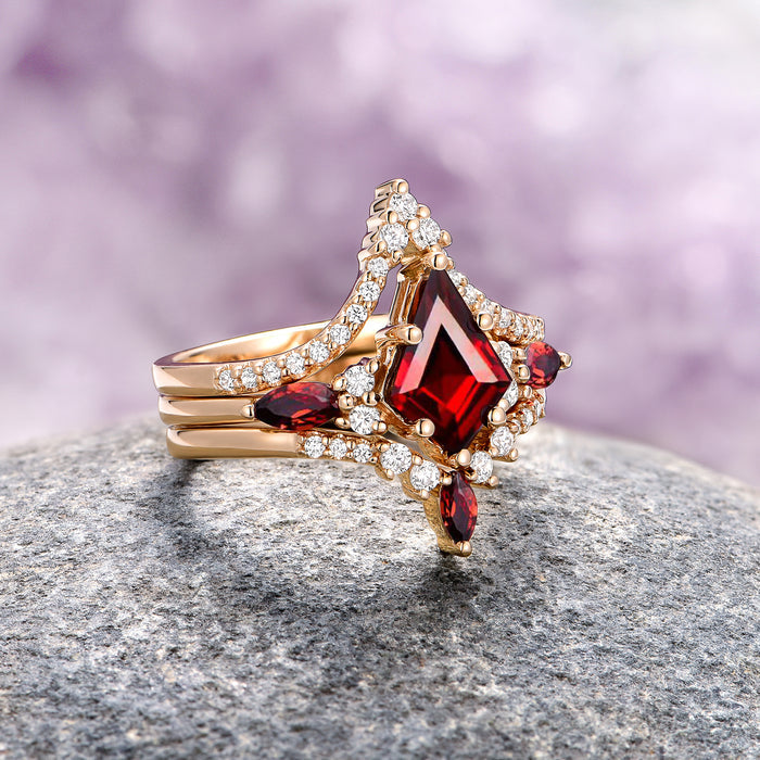 Skye Kite® Chevron Stacking Wedding Band in 14K Solid Yellow Gold paired with a marquise-cut red gemstone surrounded by sparkling diamonds, handcrafted by Aquamarise Gold, from collections including Women’s Wedding Bands and Meaningful Jewelry Gifts.