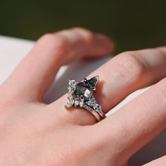 Skye Kite® Natural Herkimer Diamond Engagement Ring Set in 14K White Gold (Salt & Pepper Diamond) by Aquamarise Gold, featuring a unique kite-cut diamond with sparkling accents on a delicate band.