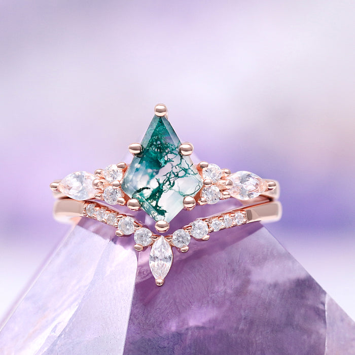 Skye Kite® Green Moss Agate Engagement Ring Set in 14K Solid Rose Gold by Aquamarise Gold, featuring a kite-shaped moss agate center and sparkling stones on elegant rose gold bands.