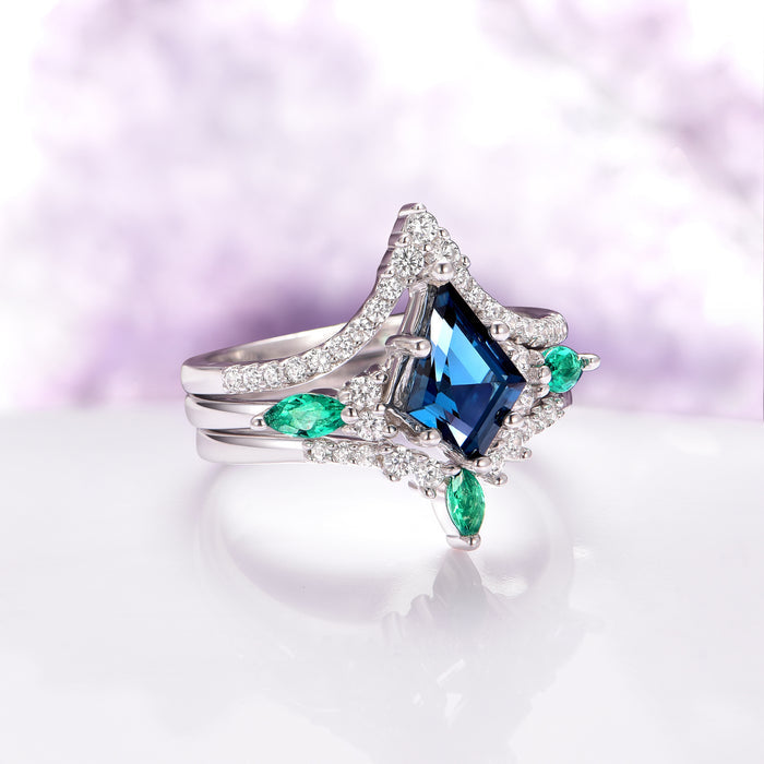 Skye Kite® Chevron Stacking Wedding Band in 14K White Gold by Aquamarise Gold showcases a sparkling white gold band accented with petite moissanite stones arranged in a delicate V-shaped design, ideal for layering or pairing with engagement rings.