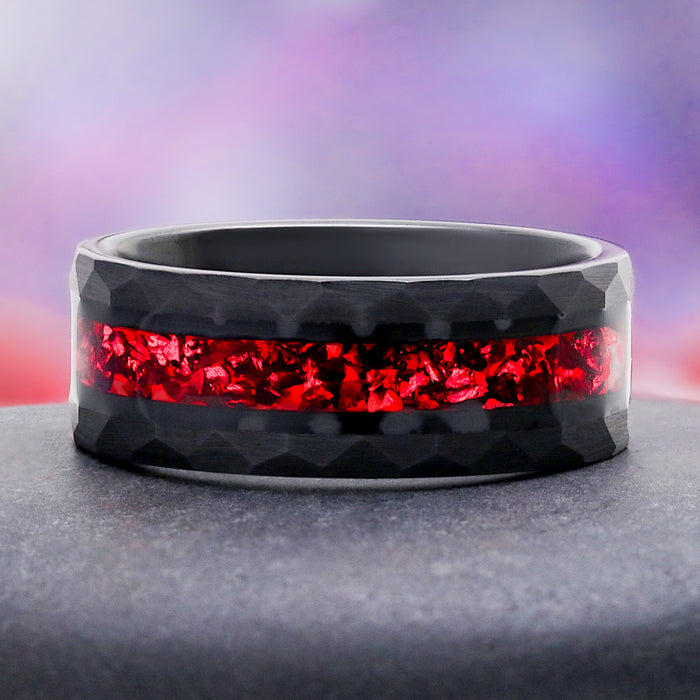 Crushed Red Garnet Men's Wedding Band in Black Tungsten Carbide (8mm), close-up of the hammered black band and crushed garnet inlay by Aquamarise