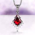 Skye Kite® Natural Red Garnet Necklace in Black Ruthenium by Aquamarise featuring a kite-cut red garnet pendant with sparkling simulated diamonds, set in a black ruthenium chain, part of January Birthstone Jewelry and Skye Kite® Jewelry Collection.