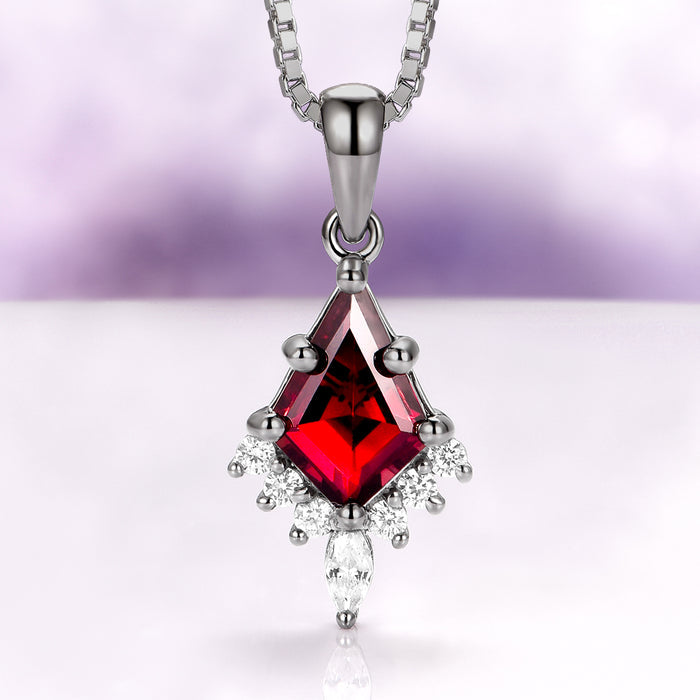 Skye Kite® Natural Red Garnet Necklace in Black Ruthenium by Aquamarise featuring a kite-cut red garnet pendant with sparkling simulated diamonds, set in a black ruthenium chain, part of January Birthstone Jewelry and Skye Kite® Jewelry Collection.