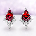 Skye Kite® Natural Red Garnet Stud Earrings in Black Ruthenium by Aquamarise, featuring kite-cut natural red garnets accented with sparkling white gemstones in an elegant black ruthenium setting, part of January Birthstone Jewelry and Skye Kite® Jewelry Collection.