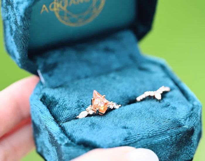 Skye Kite® Natural Sunstone Ring Set in 14K Rose Gold Vermeil by Aquamarise, featuring a kite-cut sunstone with delicate rose gold and diamond accents in a blue velvet box.