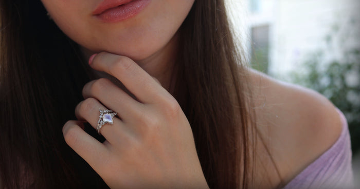 Skye Kite® Rainbow Moonstone Engagement Ring Set in 14K White Gold by Aquamarise Gold, featuring a radiant kite-shaped moonstone with delicate diamond accents in a white gold band.
