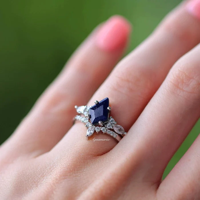 Skye Kite® Starry Night Couples Ring Set featuring a dark blue gemstone and sparkling clear stones, crafted by Aquamarise for matching couples and fantasy-inspired jewelry collections.