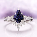 Skye Kite® Starry Night Engagement Ring Set in 14K White Gold by Aquamarise Gold, featuring a deep blue kite-cut stone with sparkling diamond accents from the Starry Night™ Rings collection.