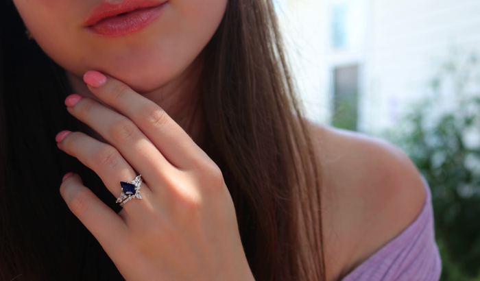 Skye Kite® Starry Night Engagement Ring Set in 14K White Gold by Aquamarise Gold, featuring a deep blue kite-shaped gemstone with diamond accents in a fantasy-inspired design.