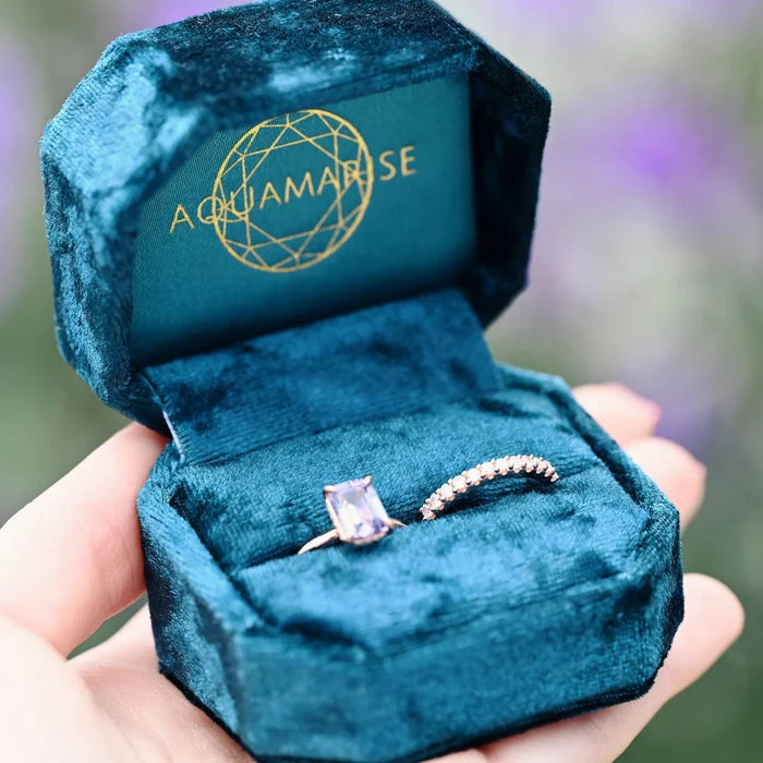 Alexandrite Engagement Ring Set- 14K Rose Gold Vermeil by Aquamarise, featuring a minimalist color-changing alexandrite and delicate rose gold band in a luxurious blue velvet box.