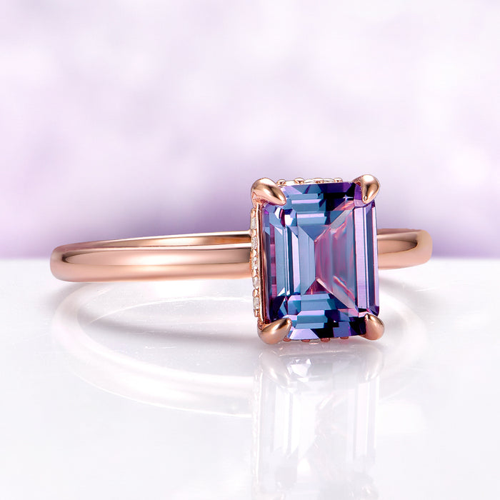 Solitaire Alexandrite Hidden Halo Engagement Ring in 14K Rose Gold Vermeil by Aquamarise, featuring a radiant emerald-cut alexandrite with a delicate hidden halo setting.