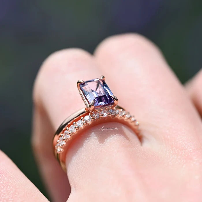 Alexandrite Engagement Ring Set- 14K Rose Gold Vermeil by Aquamarise, featuring an emerald-cut color-changing alexandrite with sparkling diamond accents on a delicate rose gold band.