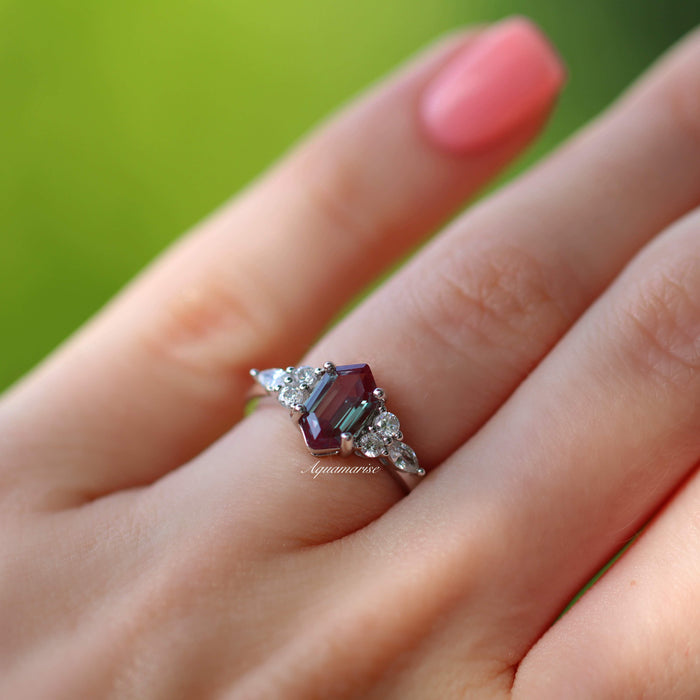Sonnet Hexagon Cut Alexandrite Engagement Ring in 14K White Gold by Aquamarise Gold, featuring a hexagon-cut alexandrite flanked by sparkling accents on a delicate white gold band.