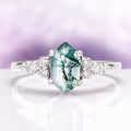 Sonnet Hexagon Green Moss Agate Ring in Sterling Silver featuring a hexagon-cut moss agate with delicate vein patterns and sparkling accent stones in a vintage-inspired design by Aquamarise.