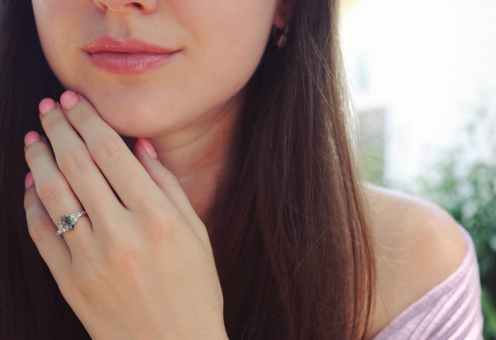 Sonnet Hexagon Green Moss Agate Ring in Sterling Silver by Aquamarise, featuring a hexagon-shaped moss agate with natural patterns on a delicate silver band, worn on hand.