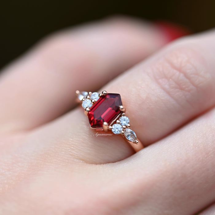 Sonnet Hexagon Ruby Ring- 14K Rose Gold Vermeil by Aquamarise, featuring a hexagon ruby center with surrounding white stones on a delicate rose gold vermeil band.