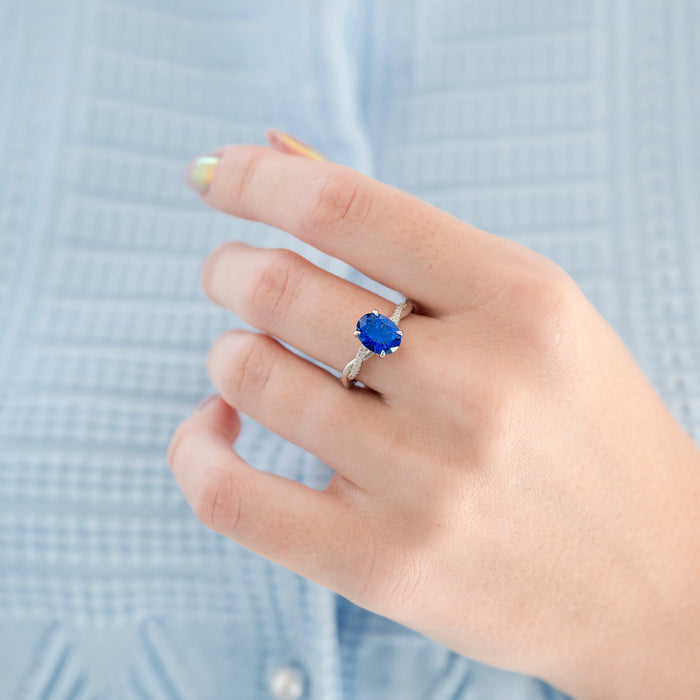 Sophia Fantasy Cut Sapphire Engagement Ring in 14K White Gold by Aquamarise Gold features a vibrant blue sapphire with a fantasy cut, set on an elegant white gold band, part of Solid Gold Engagement Rings and September Birthstone Jewelry collections.