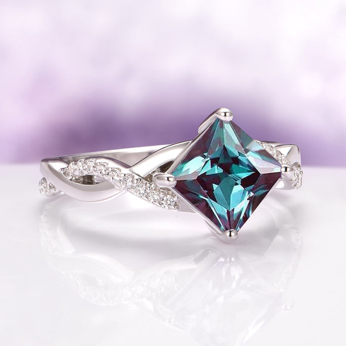 Sophia Twisted Vine Alexandrite Engagement Ring in 14K White Gold by Aquamarise Gold features a princess-cut alexandrite center stone with a twisted band accented by pavé diamonds, part of Solid Gold Engagement Rings and June Birthstone Jewelry collections.