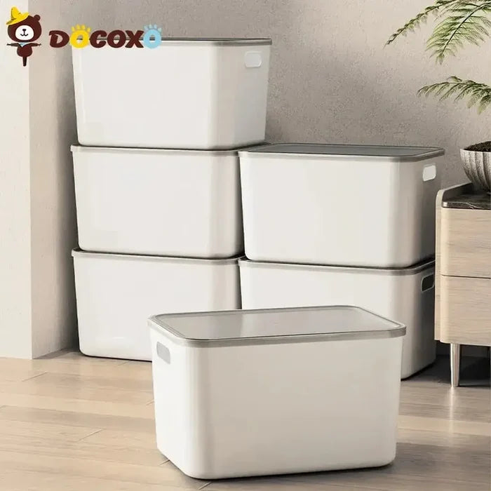 Stackable storage bins with clear lids for easy organization.