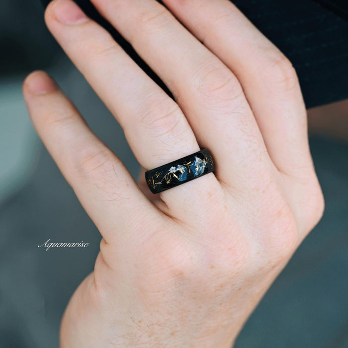 Stardust Couples Ring Set by Aquamarise featuring a black finish band with celestial-inspired gold and blue fleck inlays, symbolizing cosmic romance, part of Matching Couples' Rings, Best Selling Jewelry, and Black Finish Rings collections.