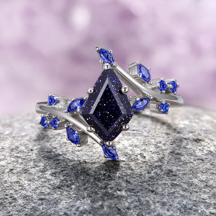 Starry Night and Fire Opal Leaf Couples Ring Set by Aquamarise, featuring a dark galaxy sandstone diamond-shaped centerpiece surrounded by marquise-cut blue gemstones on a silver band, part of Matching Couples' Rings and Starry Night™ Rings collections.