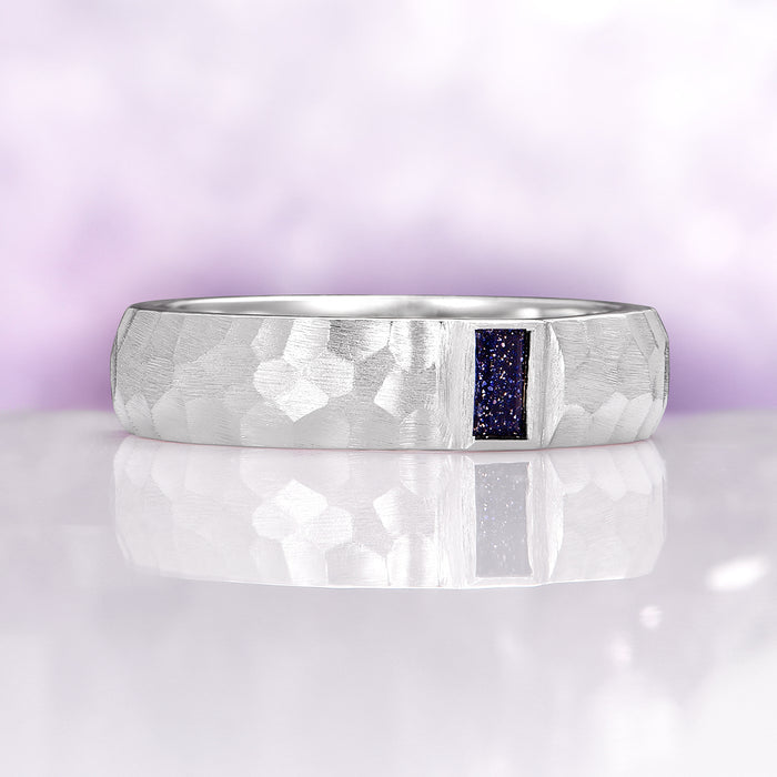 Starry Night Hammered Wedding Band in 14K White Gold (5.5mm) by Aquamarise Gold, featuring a hammered texture with a deep blue gemstone inset for a unique, elegant unisex ring.