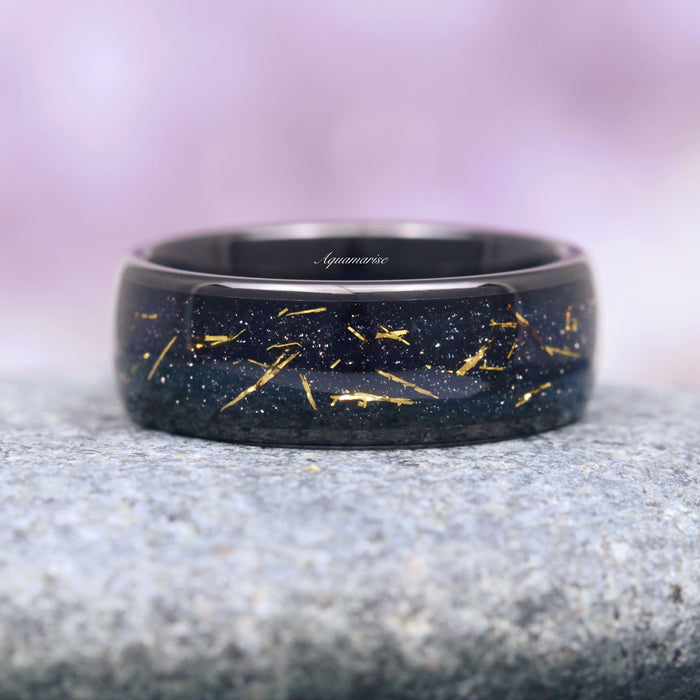 Starry Night Couples Ring Set by Aquamarise featuring a black band with shimmering gold flecks and celestial-inspired details, part of Matching Couples' Rings, Best Selling Jewelry, and Starry Night™ Rings collections.
