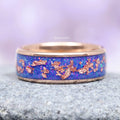 Starry Night Van Gogh Fire Opal & Rose Gold Leaf Couples Ring Set featuring a vivid blue fire opal inlay with scattered rose gold leaf fragments on a polished band, crafted by Aquamarise from Matching Couples' Rings and October Birthstone collections.