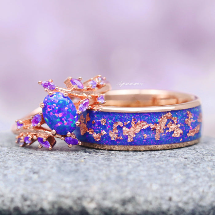 Starry Night Van Gogh Fire Opal & Rose Gold Leaf Couples Ring Set featuring a vivid blue fire opal with purple gemstone accents and intricate rose gold leaf inlay on a polished band, crafted by Aquamarise from Matching Couples' Rings and October Birthstone collections.