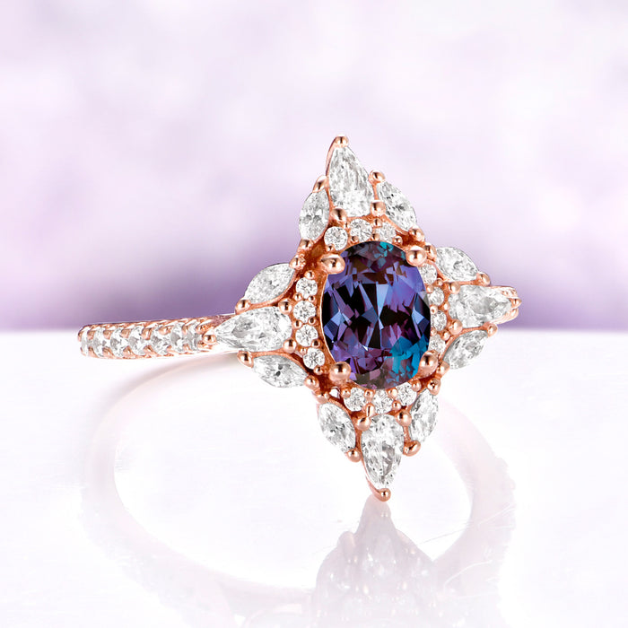 Stella Alexandrite Ring in 14K Rose Gold Vermeil by Aquamarise, angled view showing the violet-to-teal shift of the oval alexandrite.