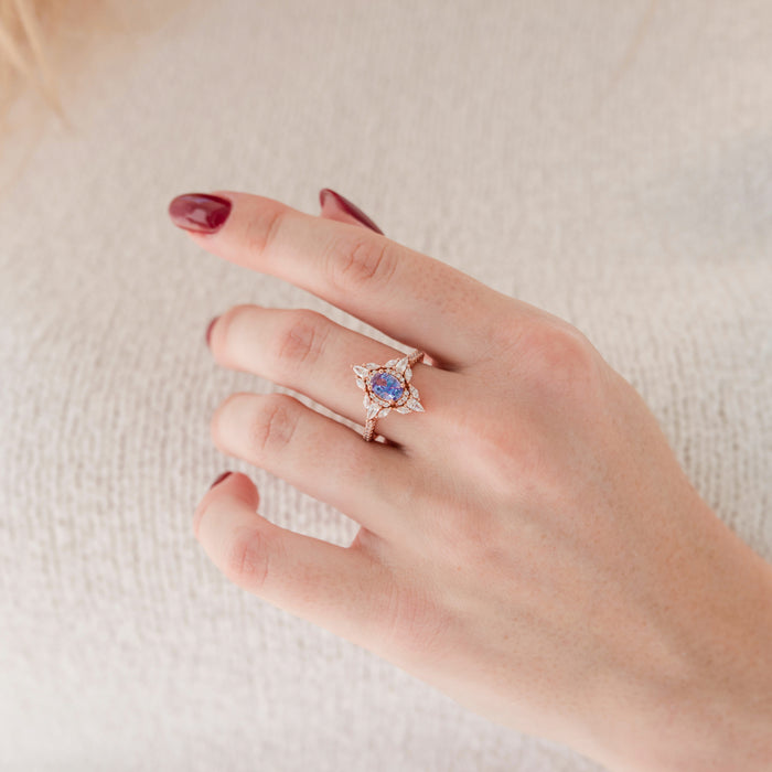 Stella Alexandrite Ring- 14K Rose Gold Vermeil by Aquamarise, featuring an oval color-shifting alexandrite with a vintage-inspired star halo on a hand, blending fantasy and nature-inspired elegance.