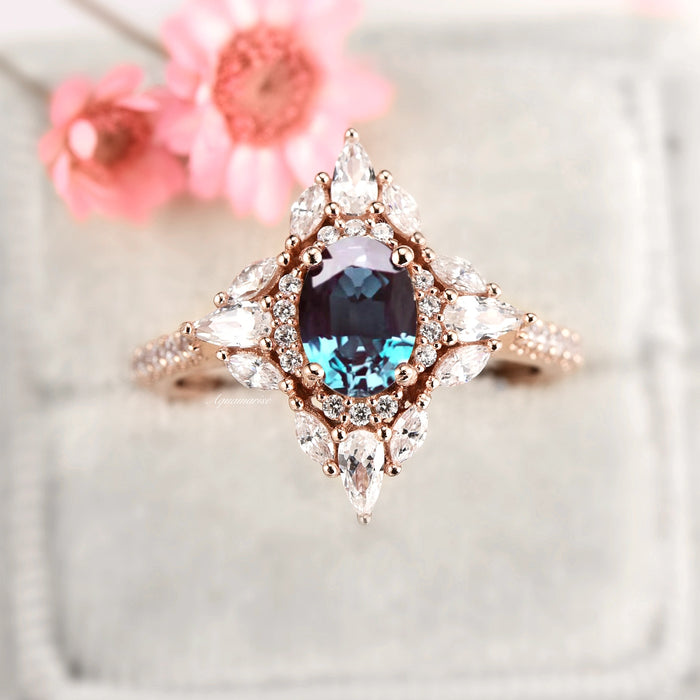 Stella Alexandrite Ring- 14K Rose Gold Vermeil by Aquamarise, showcasing an oval color-changing alexandrite framed by marquise and round stones in a vintage-inspired rose gold setting.