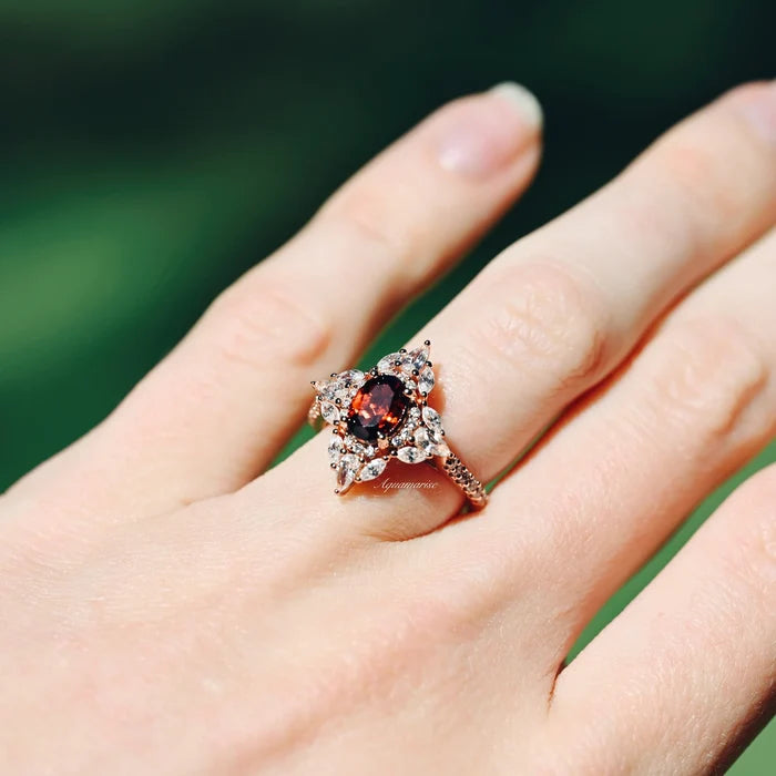 Stella Natural Red Garnet Ring- 14K Rose Gold Vermeil by Aquamarise featuring a vintage-inspired garnet center with pavé white stones on a rose gold band, perfect for engagement or promise rings.
