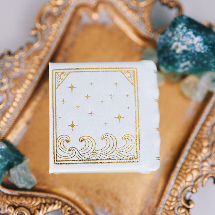 Summer Court Handmade Leather Book Ring Box- Seaglass Glow Edition (Small) by Aquamarise, displayed on ornate gold tray with sea glass, from Ring Boxes & Keepsake Proposals collection.