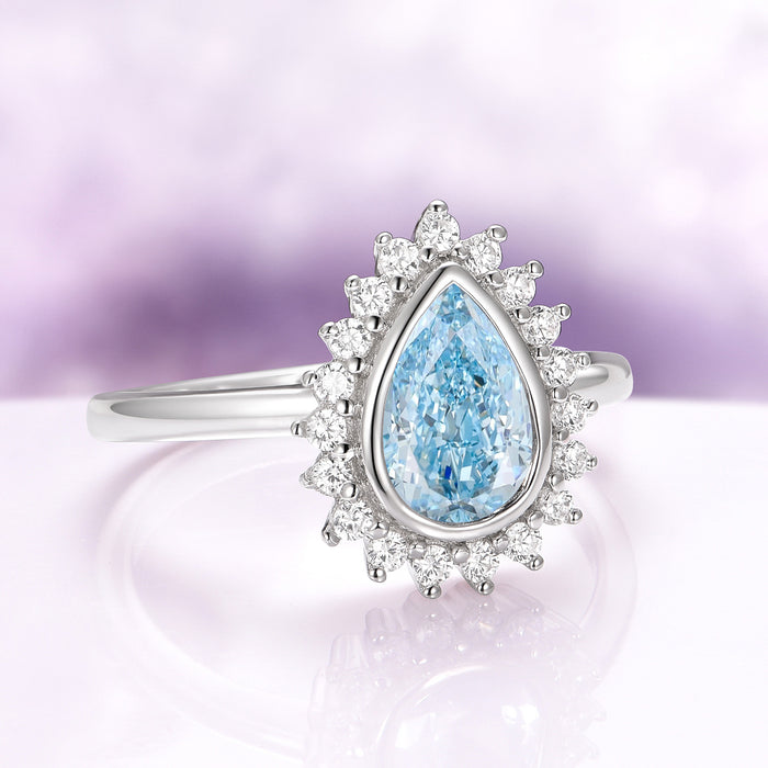 Teardrop Bezel Aquamarine Ring in Sterling Silver by Aquamarise, featuring a lab-created aquamarine with cubic zirconia accents in a vintage-inspired sterling silver setting.