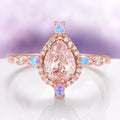 Teardrop Morganite & Fire Opal Engagement Ring in 14K Solid Rose Gold by Aquamarise Gold featuring a pear-shaped morganite center with fire opal and diamond accents on an elegant band.