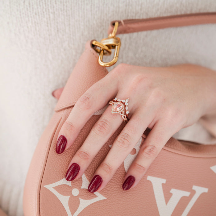 Teardrop Morganite Ring Set in 14K Rose Gold Vermeil by Aquamarise, featuring a peachy-pink teardrop gemstone with delicate pear-shaped accents on an intricate rose gold vermeil band.