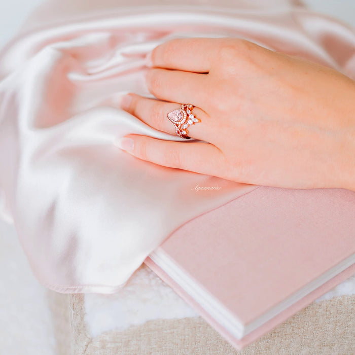 Teardrop Morganite Ring Set in 14K Rose Gold Vermeil showcasing a peachy-pink teardrop morganite with delicate accent stones on a romantic rose gold vermeil band by Aquamarise.