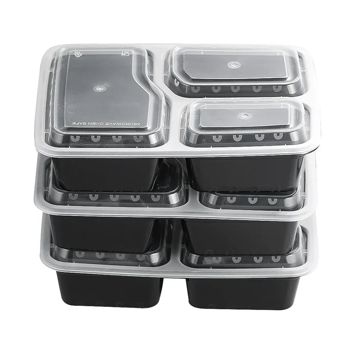 Three compartment meal prep containers 12-pack stacked with clear lids for meal prepping.