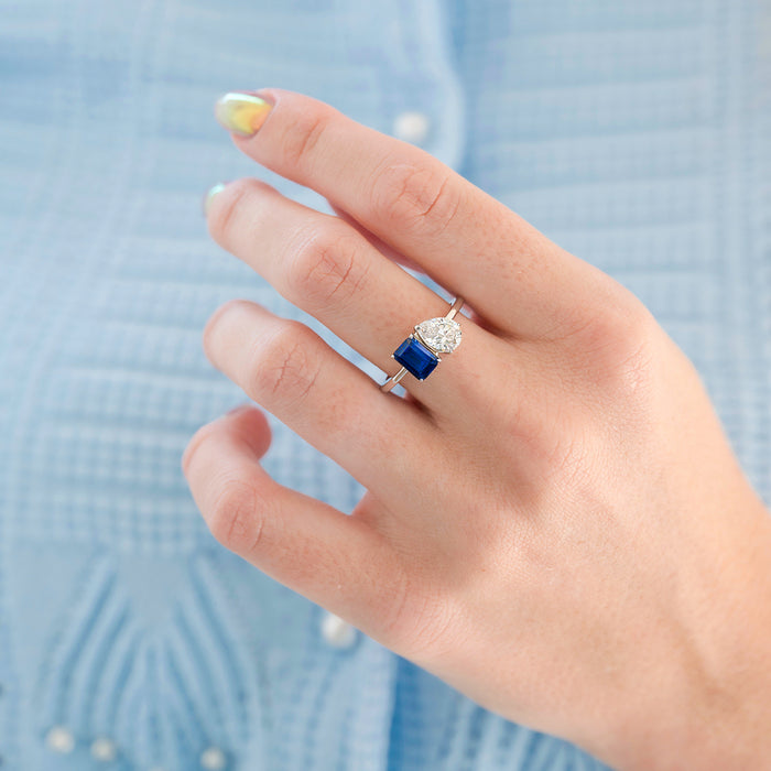 Toi Et Moi Blue Sapphire and Lab-Grown Diamond Engagement Ring in 14K White Gold (IGI Certified) by Aquamarise Gold shown on a hand, featuring a modern 14K white gold band with a deep blue sapphire and a sparkling lab-grown diamond, part of Solid Gold Engagement Rings and Birthstone Jewelry collections.