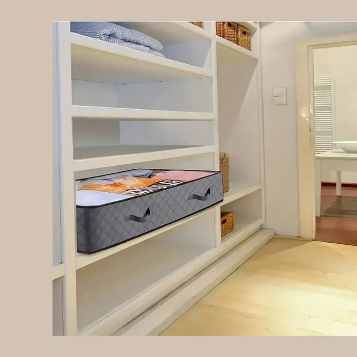 Under-bed storage bags for bedding organized neatly in a closet shelf, showcasing space-saving design.