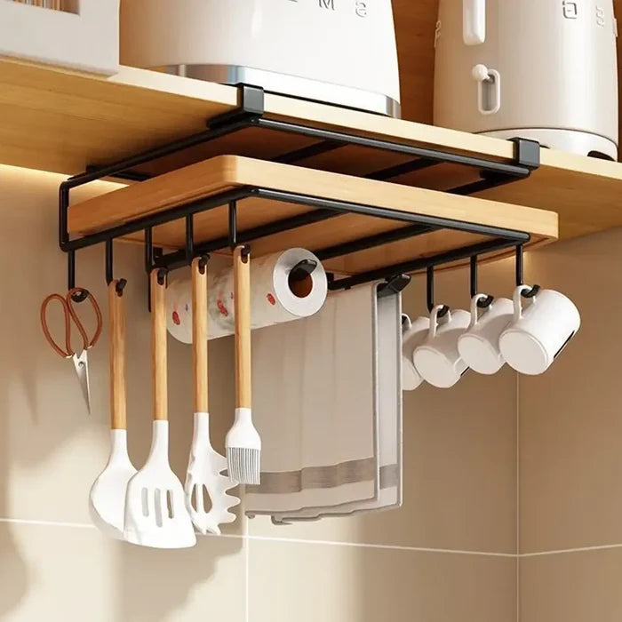 Under-Cabinet Kitchen Organizer Rack installed beneath cabinet holding kitchen towels