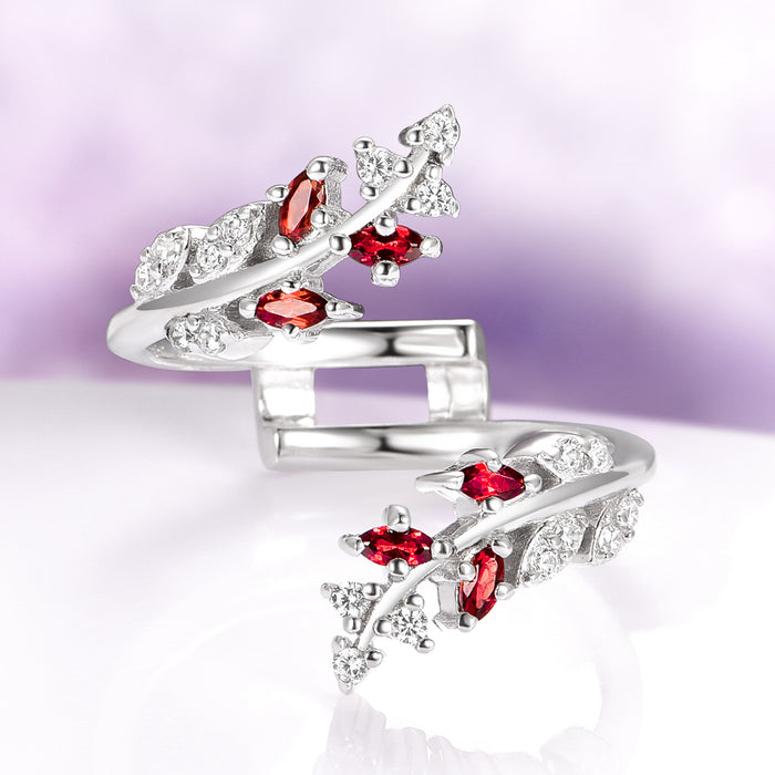 Red Garnet Leaf Ring Guard in 14K White Gold featuring a nature-inspired design with deep red natural garnets and sparkling diamond accents set on a handcrafted white gold band by Aquamarise Gold.