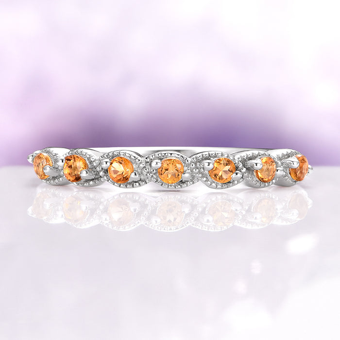Vintage Natural Citrine Band in Sterling Silver by Aquamarise features a delicate vintage-inspired design with round natural citrine gemstones set in a sterling silver band adorned with intricate milgrain details, ideal for birthstone jewelry and anniversary gifts.