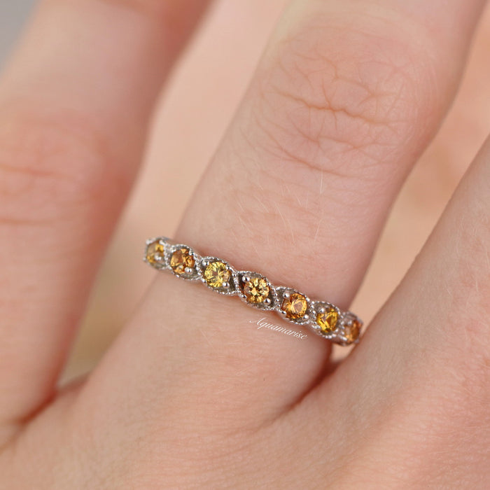 Vintage Natural Citrine Band in Sterling Silver by Aquamarise features a delicate row of round citrine gemstones set in a vintage-inspired sterling silver band with milgrain detailing, ideal for birthstone and anniversary jewelry.